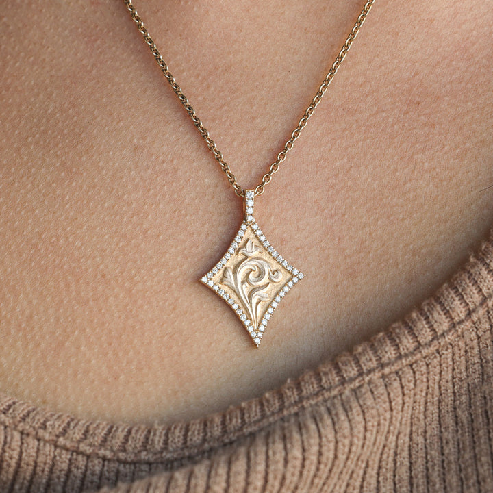 Sculpted Scroll, French Set Diamonds, and 14k Gold Pendant