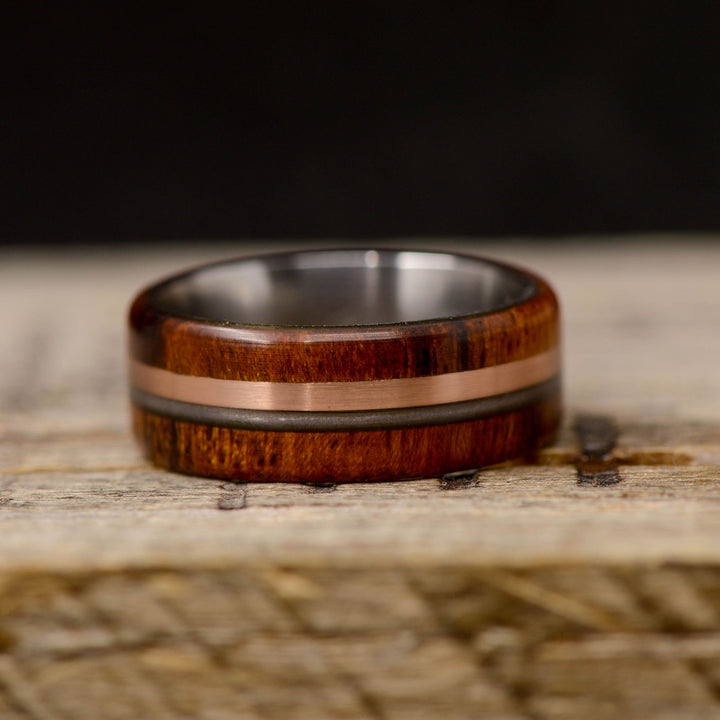 Ironwood, Rose Gold, and Piano String Inlays