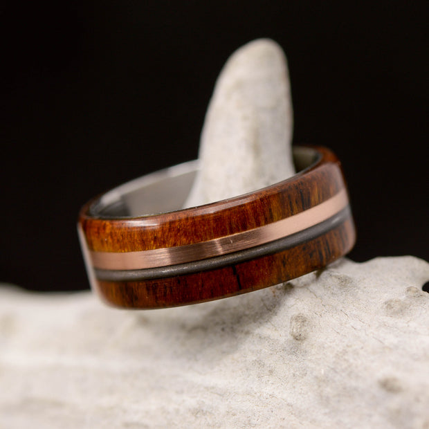 Ironwood, Rose Gold, and Piano String Inlays