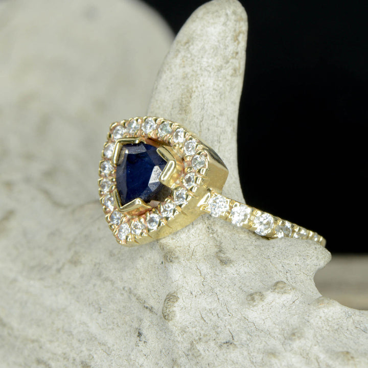 Sapphire Trillion Halo Ring with Diamond Accents