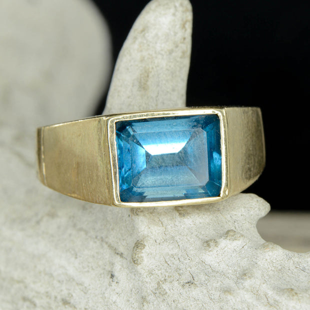 Gold Signet Ring with a Emerald Cut Swiss Blue Topaz