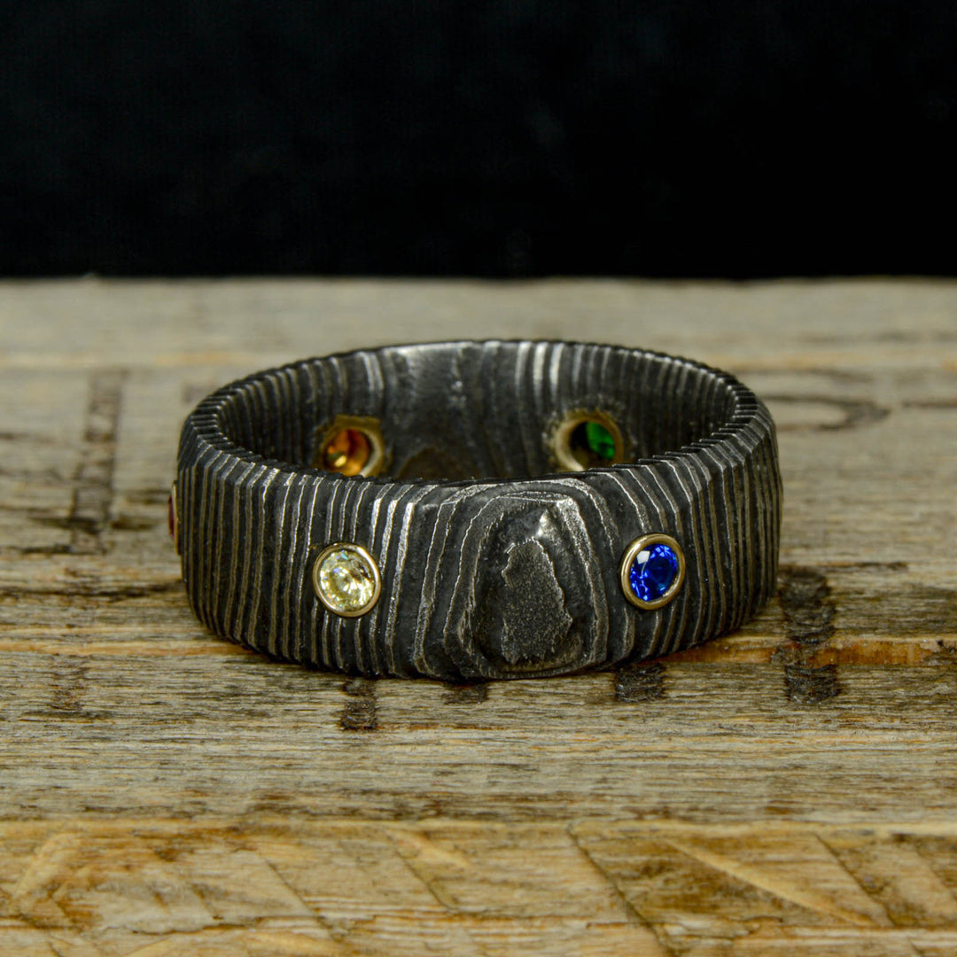 Infinity Ring, Gold, Dark Damascus Steel, & Gemstones