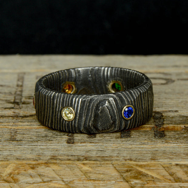 Infinity Ring, Gold, Dark Damascus Steel, & Gemstones