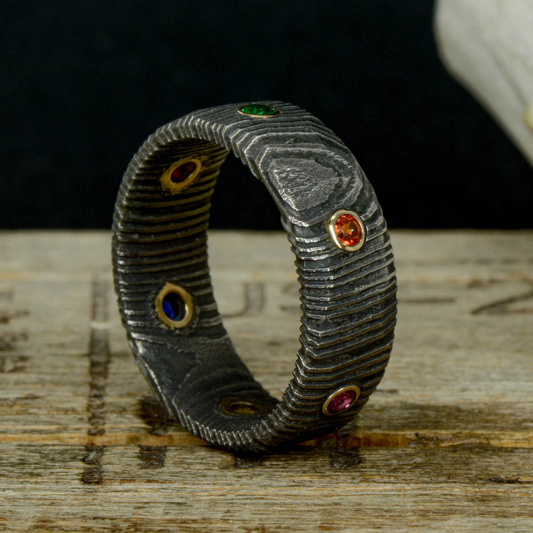 Infinity Ring, Gold, Dark Damascus Steel, & Gemstones