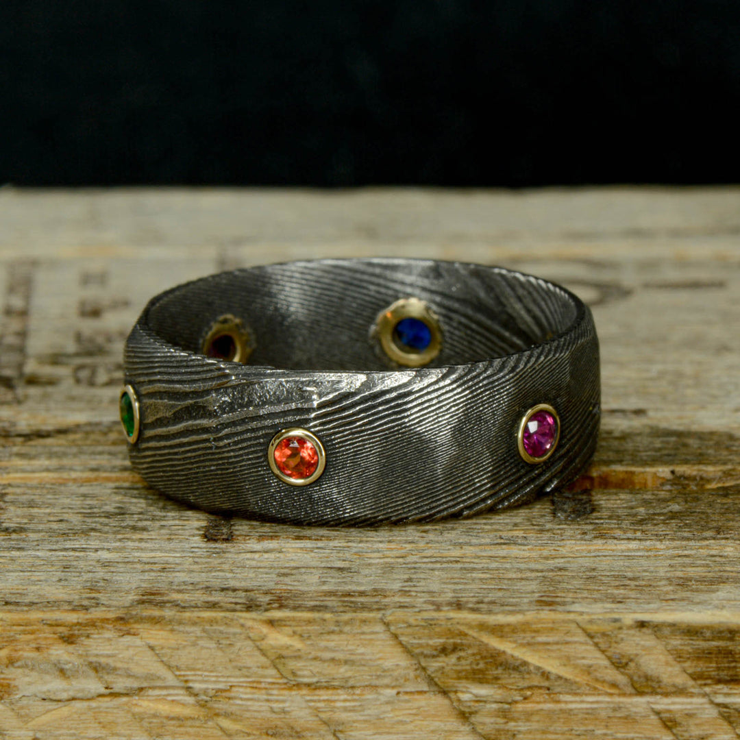 Infinity Ring, Gold, Dark Damascus Steel, & Gemstones