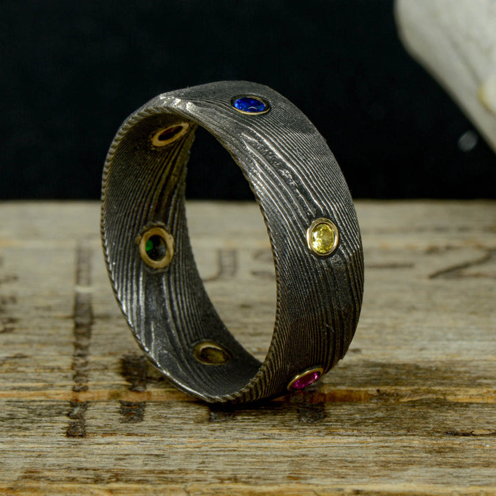 Infinity Ring, Gold, Dark Damascus Steel, & Gemstones