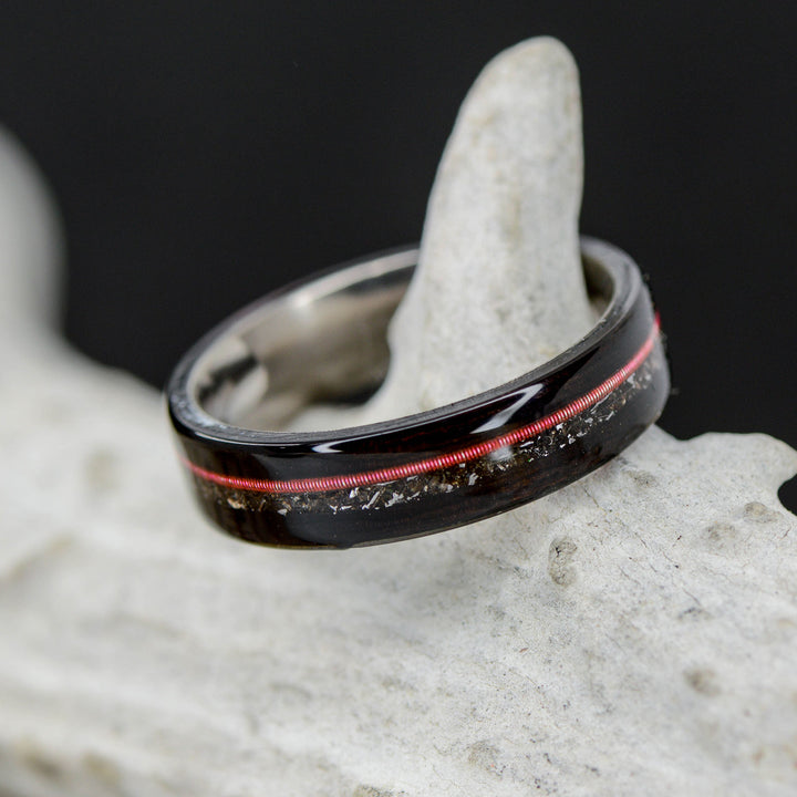 Blackwood, Red Guitar String, and Crushed Meteorite Inlays