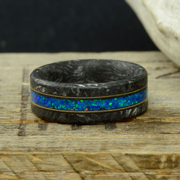 "The Cithern" - Forged Carbon Fiber Ring with Blue Opal and Guitar Strings