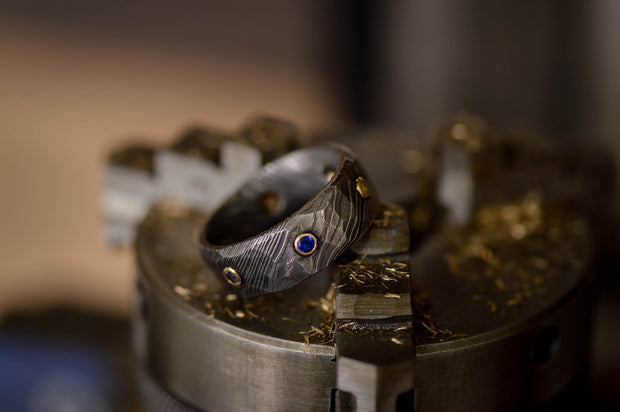Infinity Ring, Gold, Dark Damascus Steel, & Gemstones