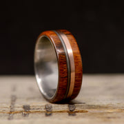 Ironwood, Rose Gold, and Piano String Inlays