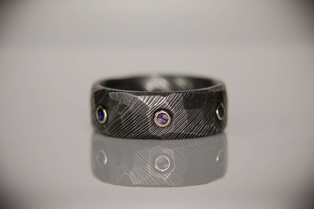 Infinity Ring, Gold, Dark Damascus Steel, & Gemstones